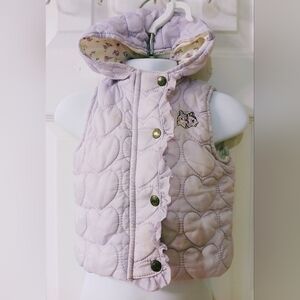 Infant girls puffer vest, 9 months, lavender w/ soft floral lining.Zipper &snaps